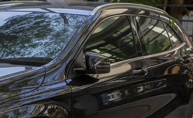 Reduction of Glare on Tinted Window for Black Car